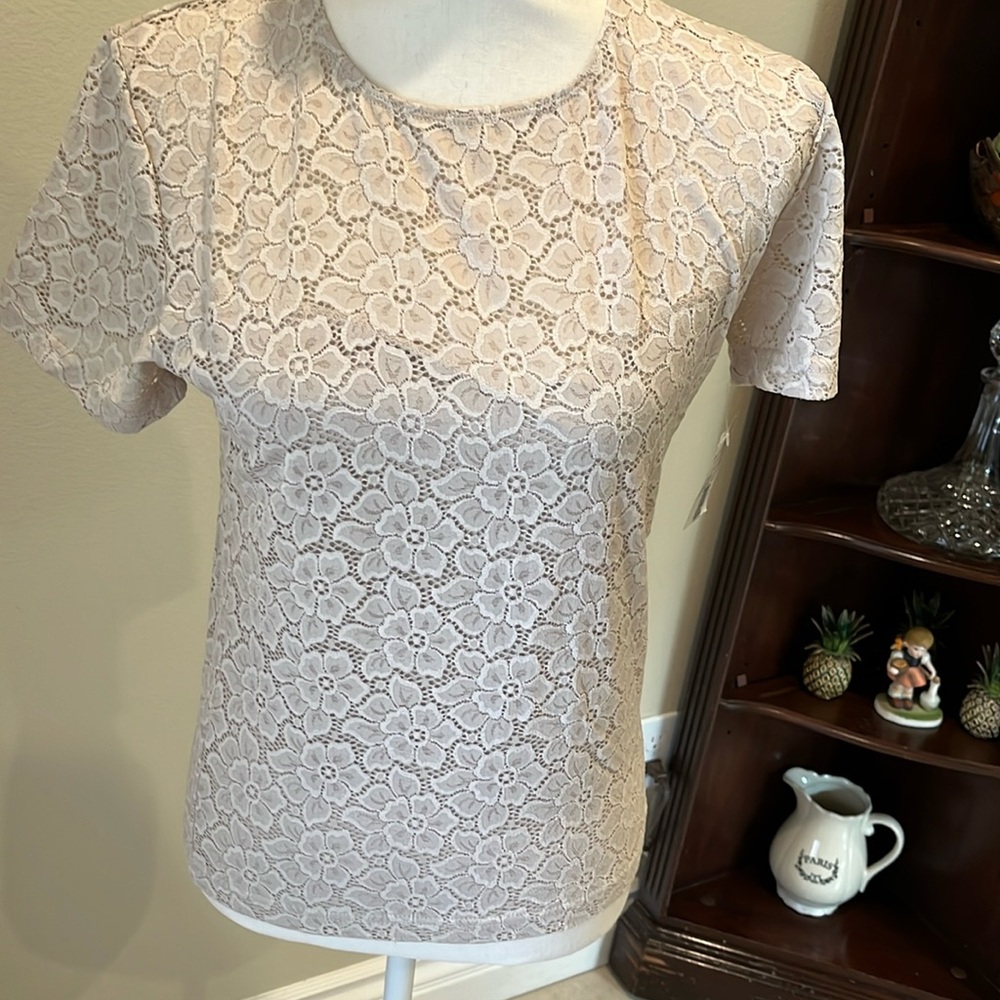 Lace top with Lycra & spandex Medium sheer at neck with lined bodice NWT